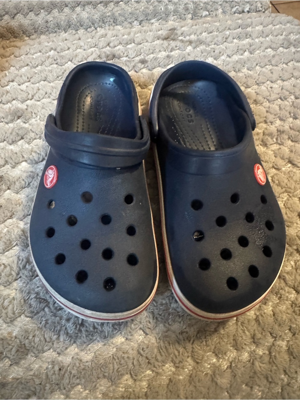 CROCS Navy Kids Clogs with Red Logo Accent